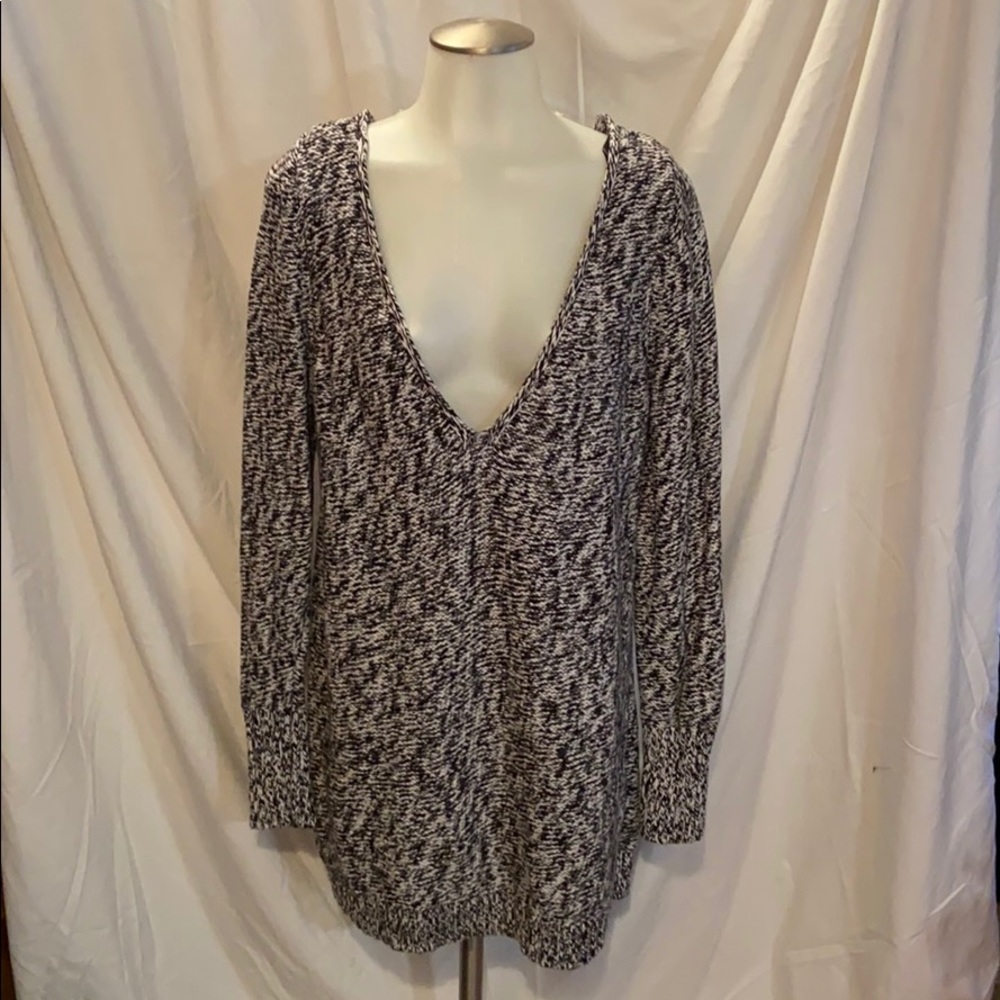 Woman’s long sweater